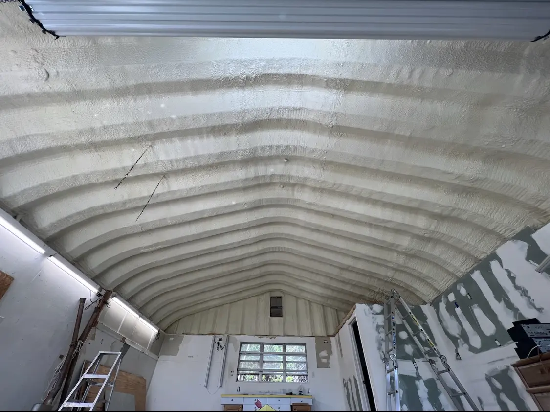 Spray polyurethane foam applied to the underside of a metal roof deck in Maricopa